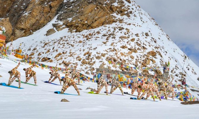  ITBP personnel practice 'yoga' on the occasion of the 6th International Day of Yoga, at Khardung La in Ladakh, Sunday, June 21, 2020. (PTI Photo) 